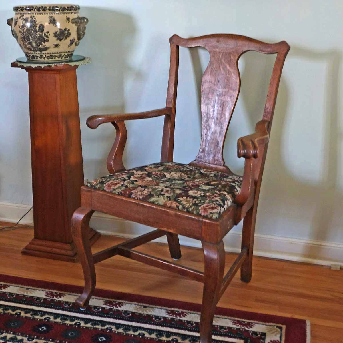photo of 1087 Armchairs, purchased by Cass Gilbert for the 1905 Minnesota State Capitol, carved wood with fabric cushion seat cover, pair located in South St, Paul, Minnesota