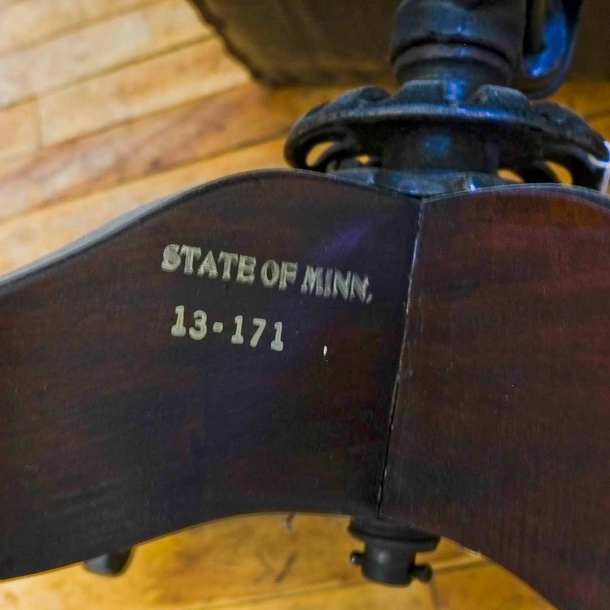 Detail of DD Swivel Chair, designed by Cass Gilbert for the 1905 Minnesota State Capitol, carved wood, leather